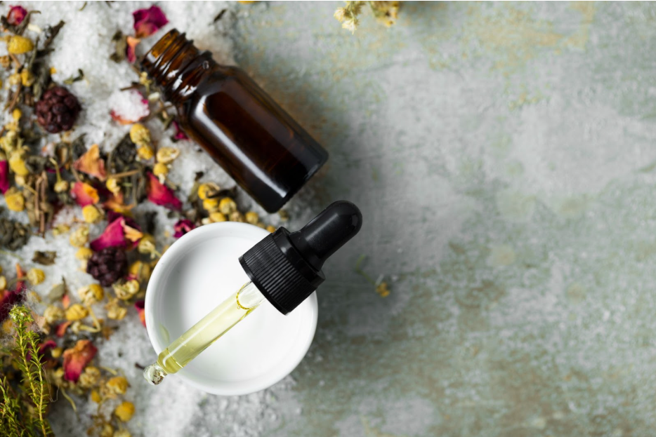 стъклено шише с етерично масло 